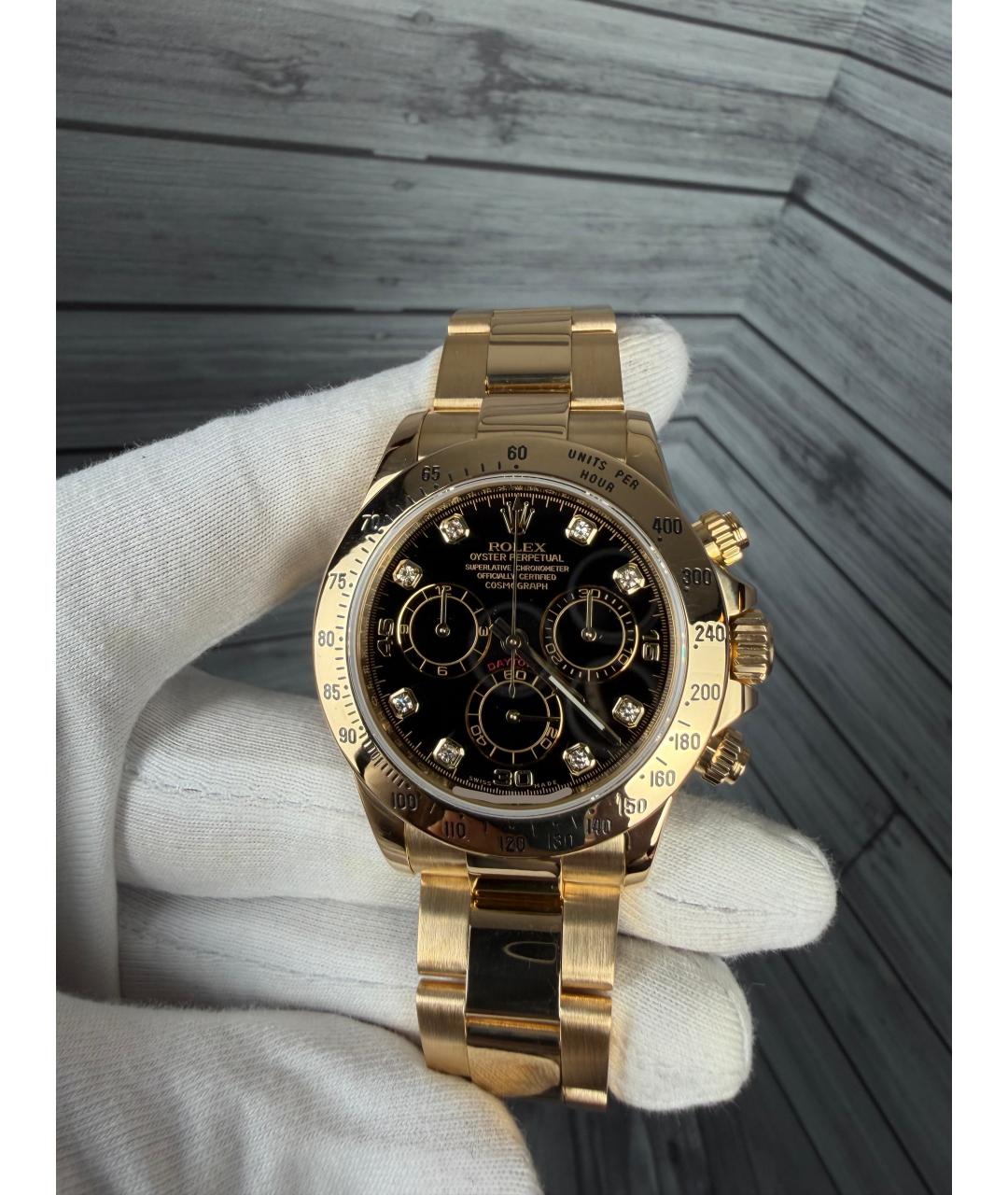 ROLEX Черные часы из желтого золота, фото 3