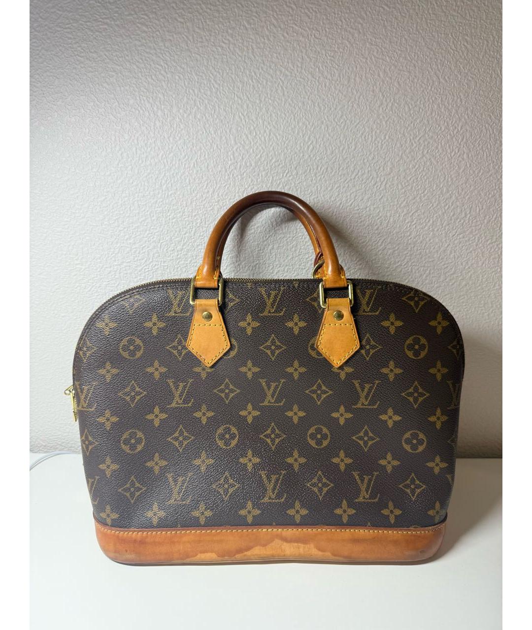 LOUIS VUITTON Коричневая кожаная сумка с короткими ручками, фото 9