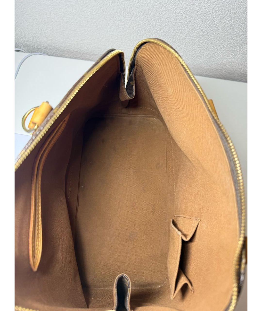 LOUIS VUITTON Коричневая кожаная сумка с короткими ручками, фото 8