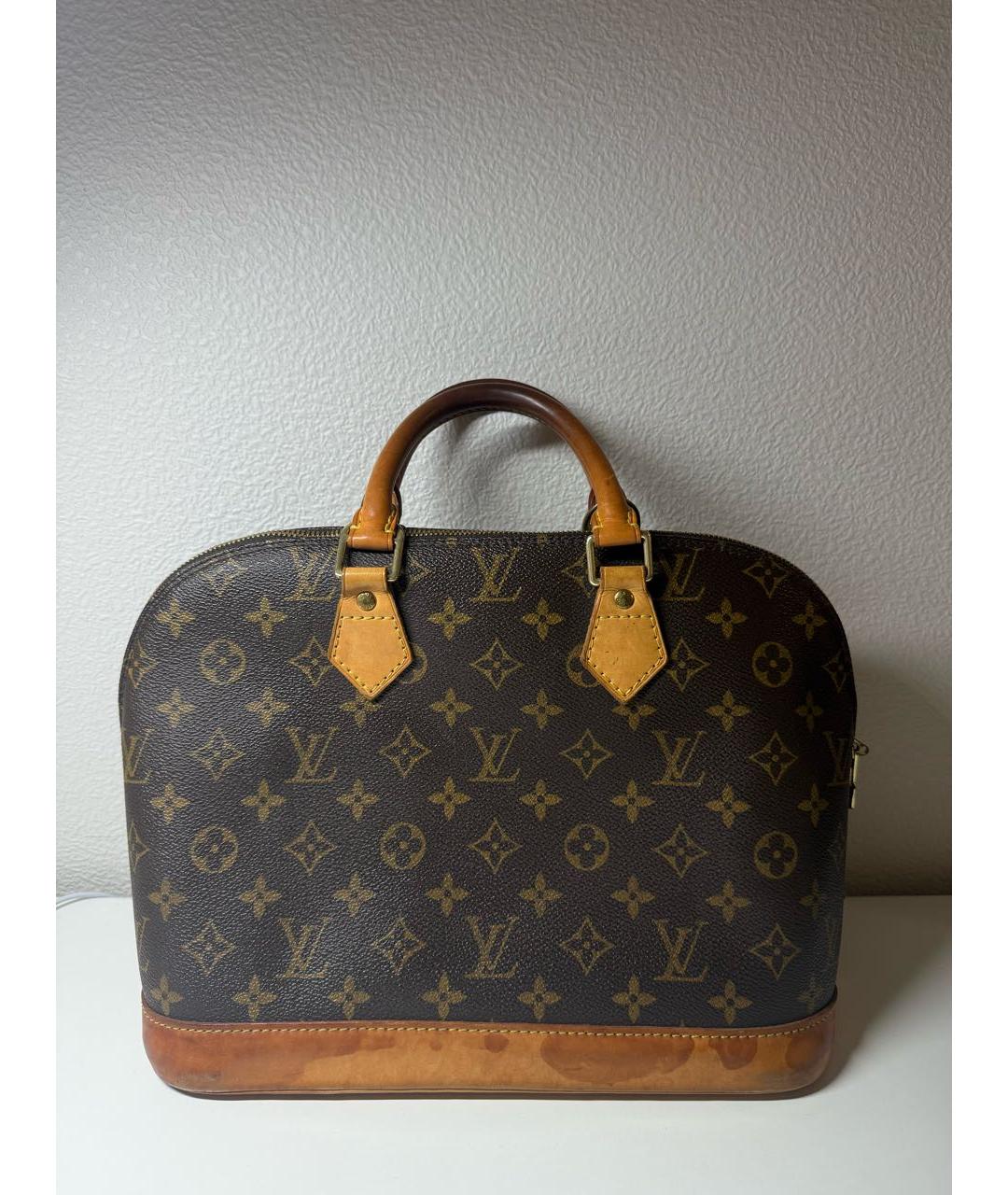 LOUIS VUITTON Коричневая кожаная сумка с короткими ручками, фото 3