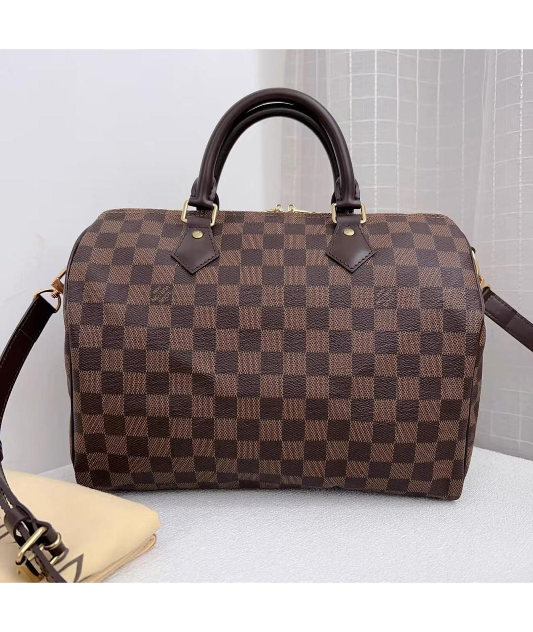 LOUIS VUITTON Коричневая кожаная сумка через плечо, фото 8