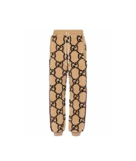 GUCCI Спортивные брюки и шорты