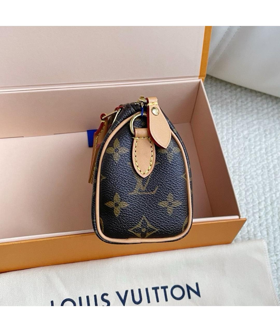 LOUIS VUITTON Коричневая кожаная сумка с короткими ручками, фото 6