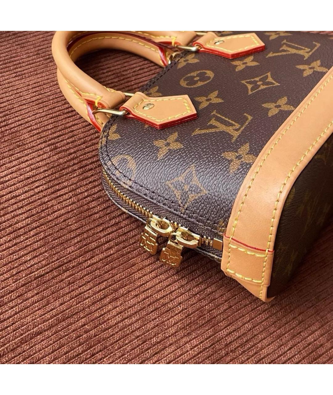 LOUIS VUITTON Коричневая кожаная сумка с короткими ручками, фото 6