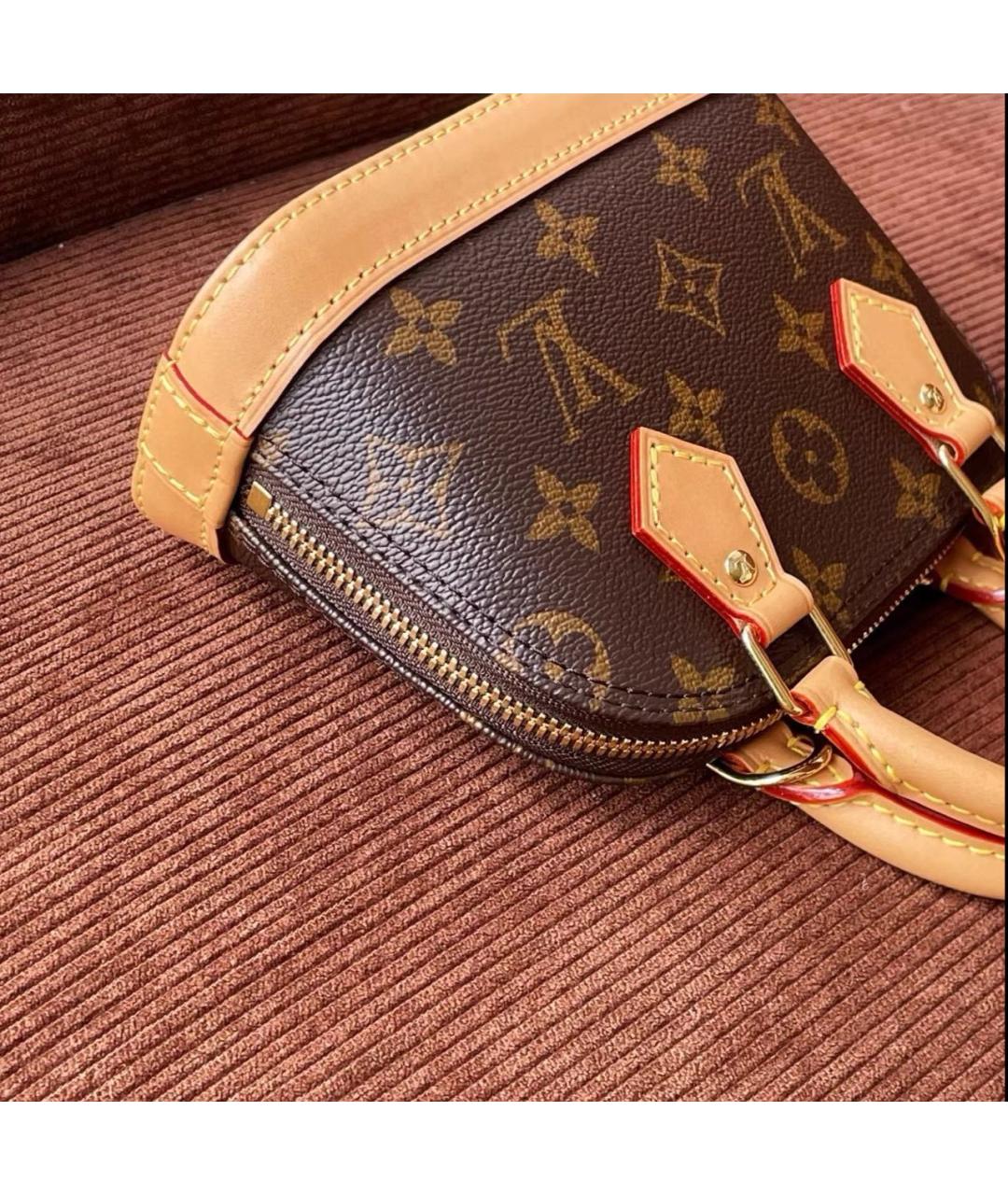 LOUIS VUITTON Коричневая кожаная сумка с короткими ручками, фото 8