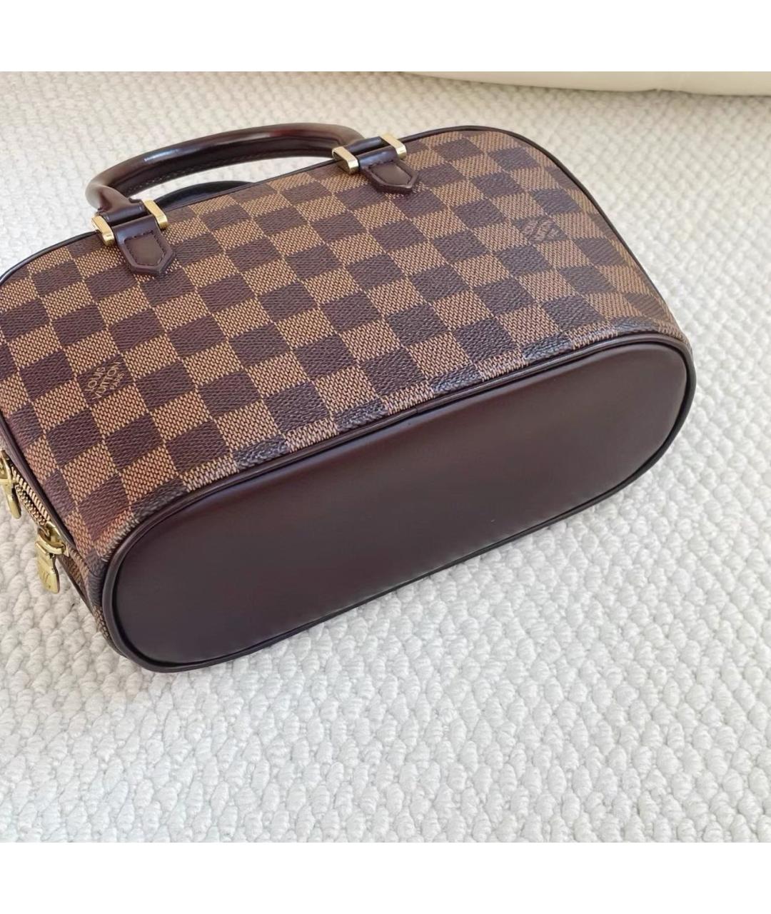 LOUIS VUITTON Коричневая кожаная сумка с короткими ручками, фото 6