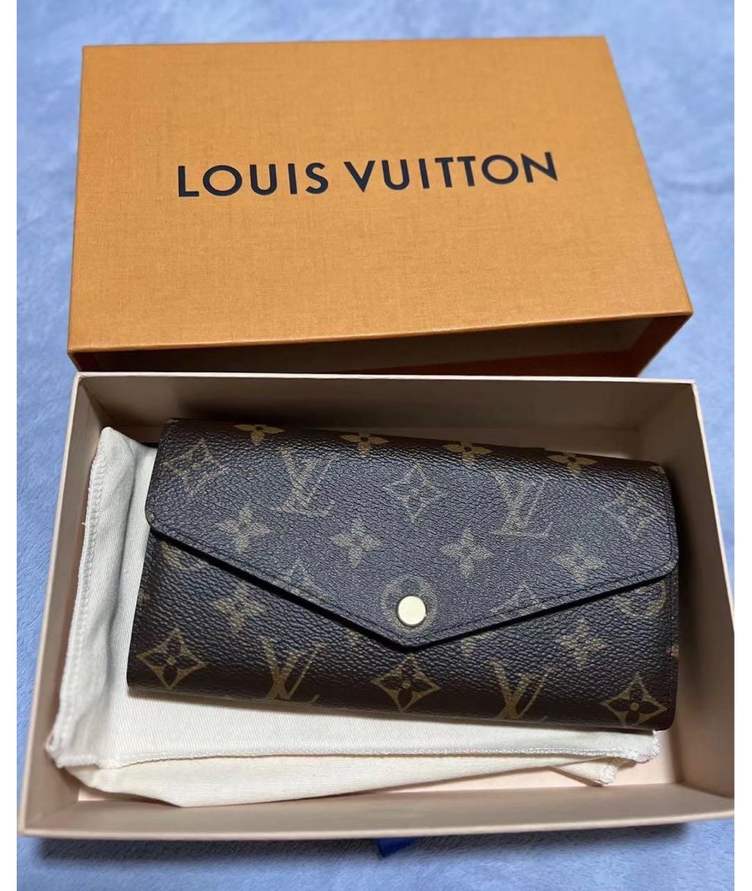 LOUIS VUITTON Коричневый кожаный кошелек, фото 6