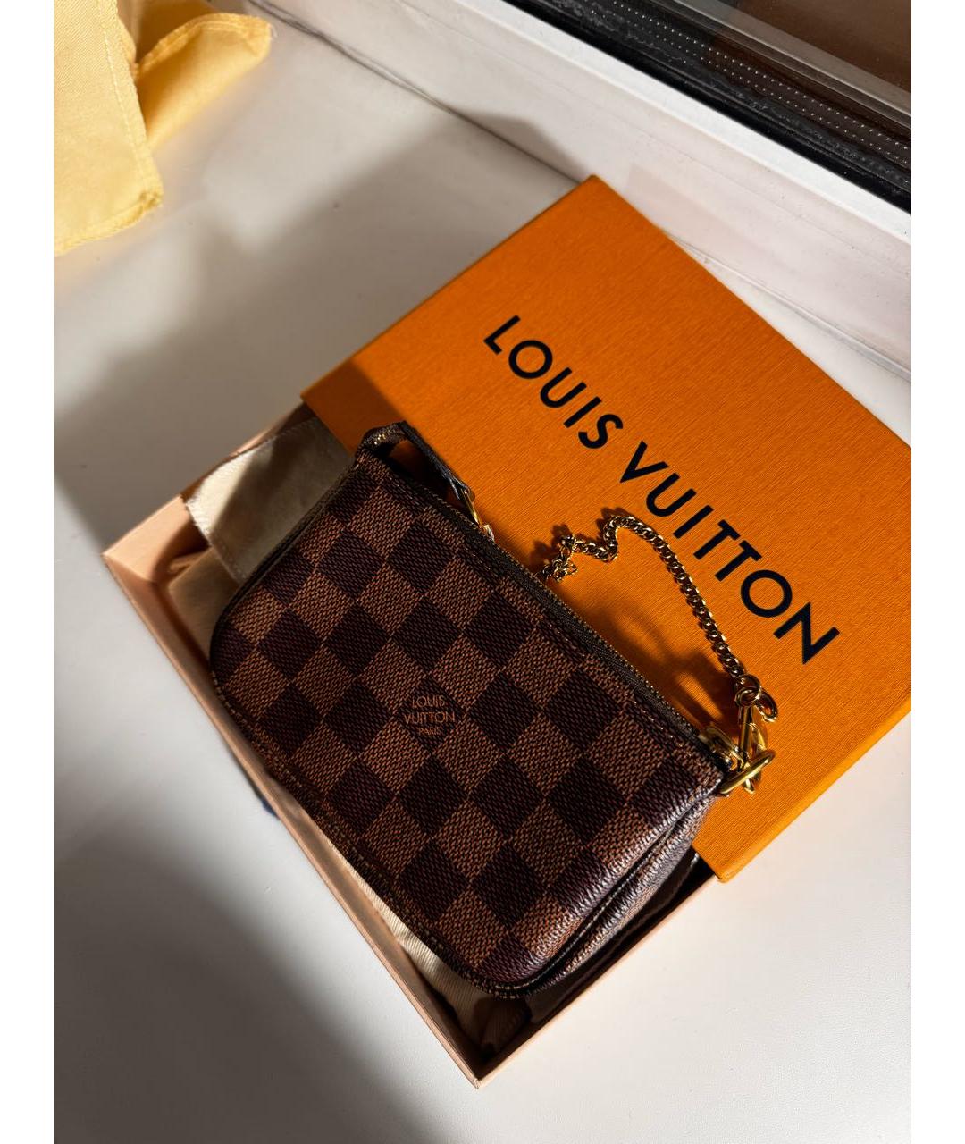 LOUIS VUITTON Коричневая кожаная сумка с короткими ручками, фото 3