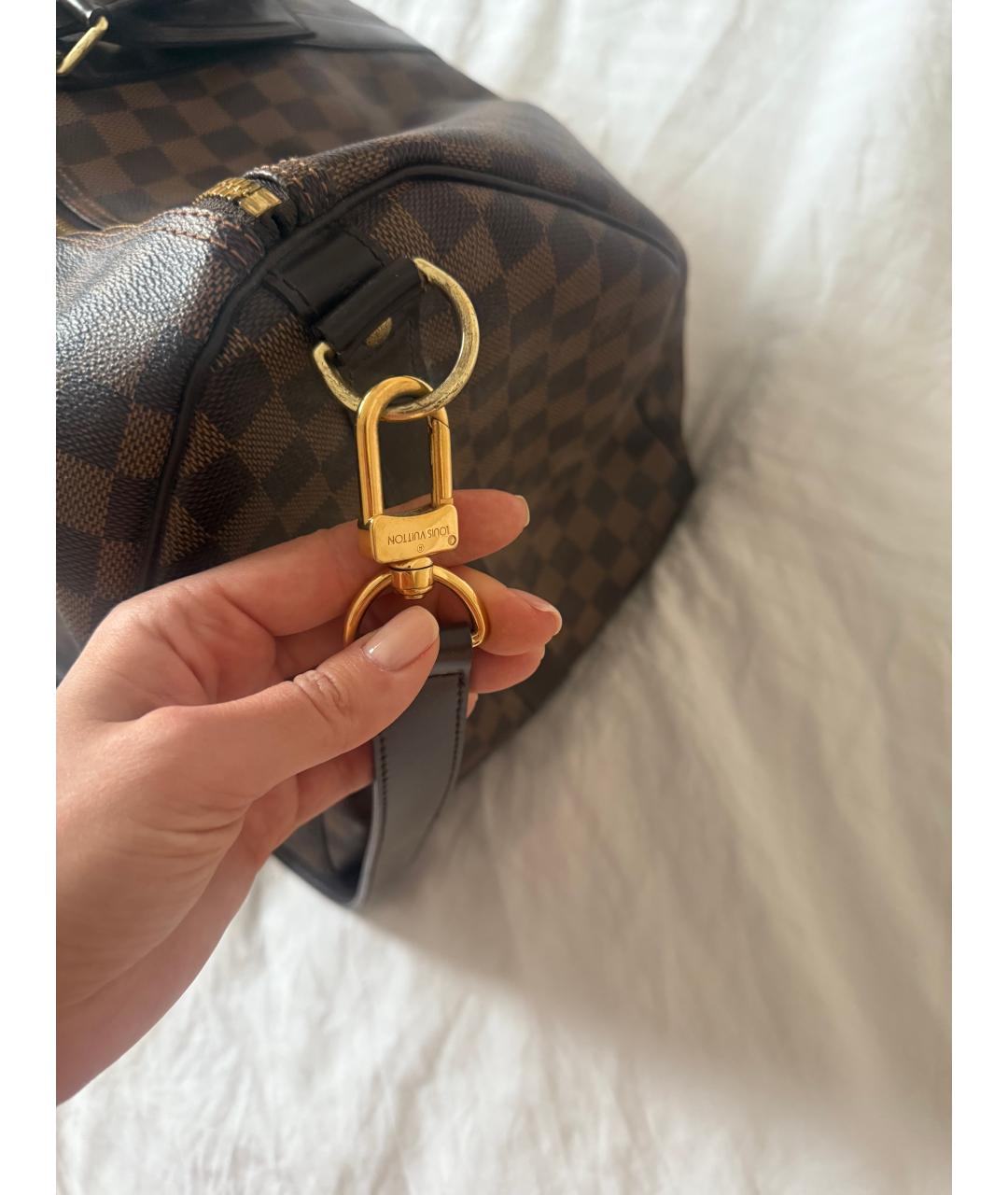 LOUIS VUITTON Коричневая кожаная дорожная/спортивная сумка, фото 6