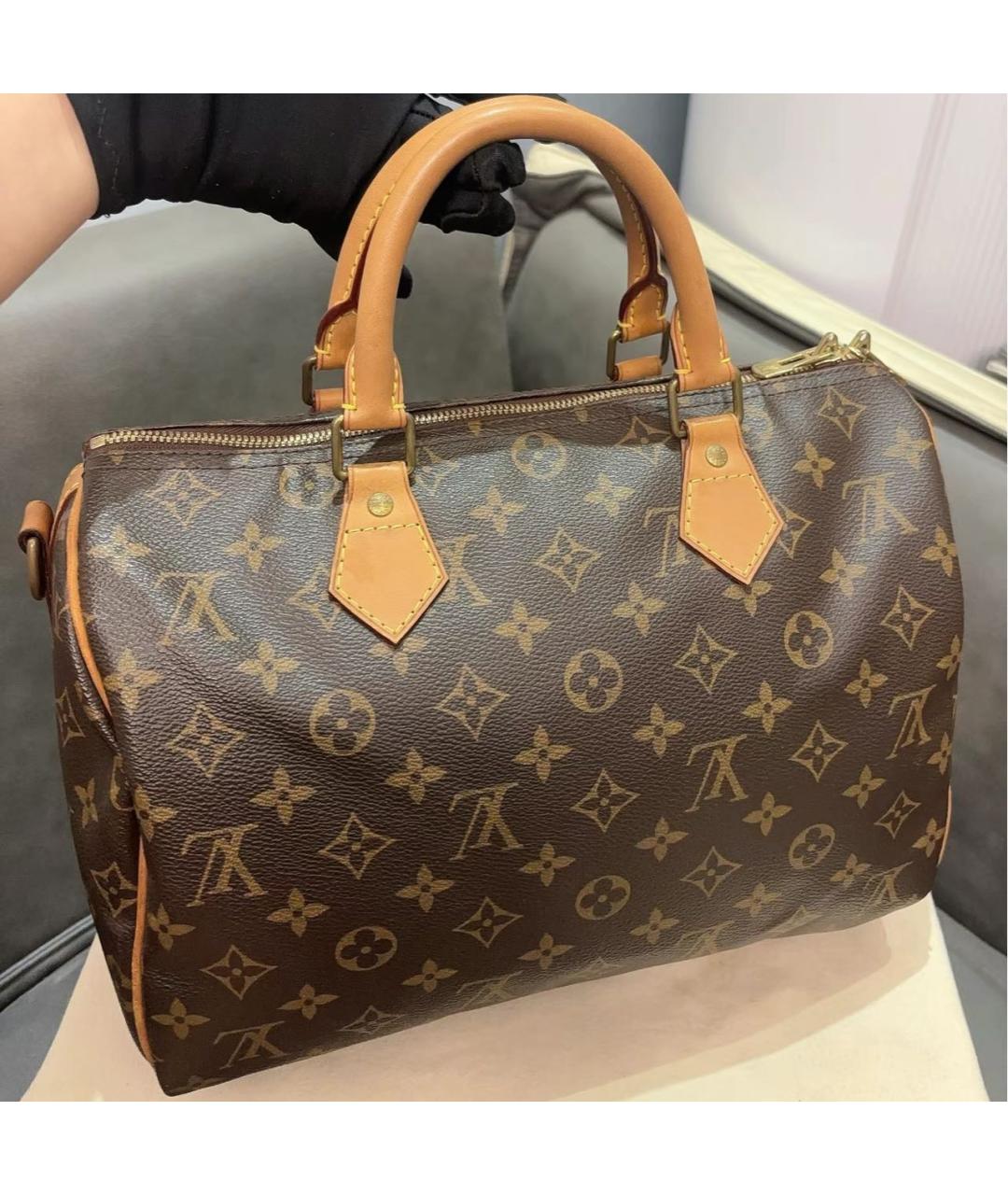 LOUIS VUITTON Коричневая кожаная сумка с короткими ручками, фото 4