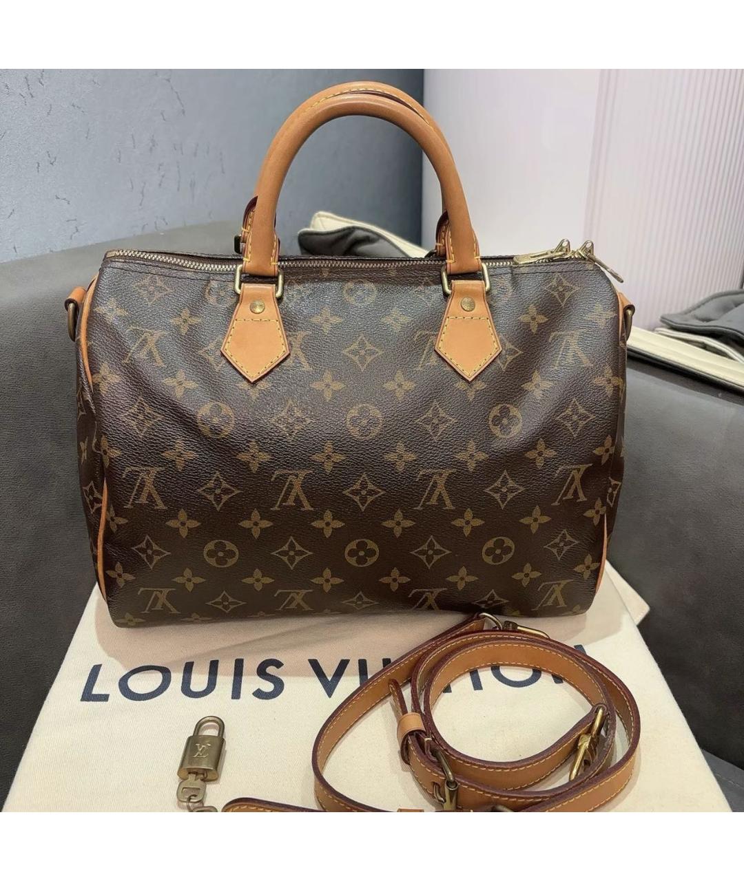 LOUIS VUITTON Коричневая кожаная сумка с короткими ручками, фото 9