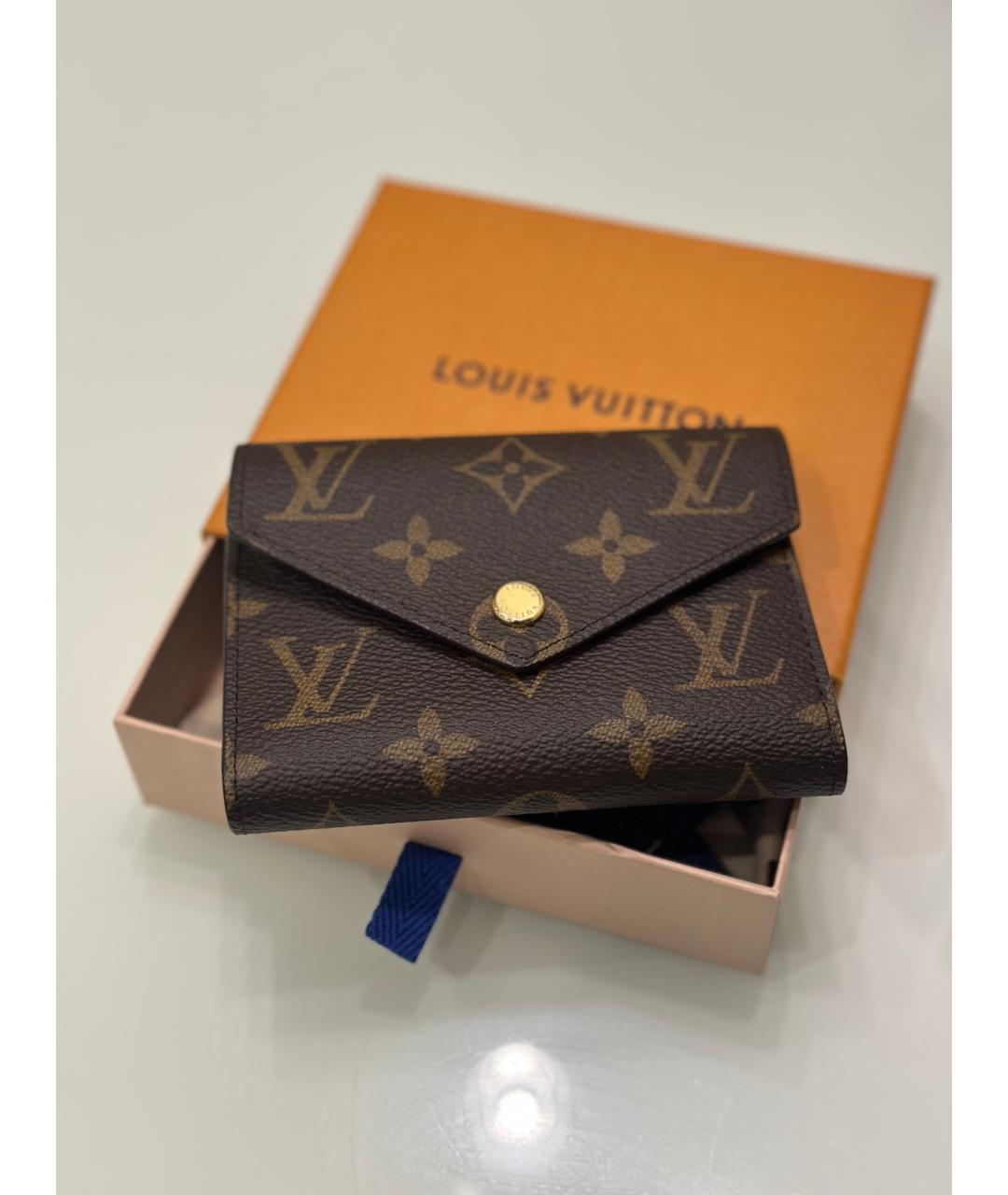 LOUIS VUITTON Коричневый кожаный кошелек, фото 5