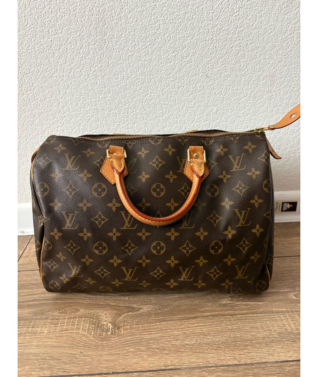 LOUIS VUITTON Коричневая кожаная сумка с короткими ручками, фото 3