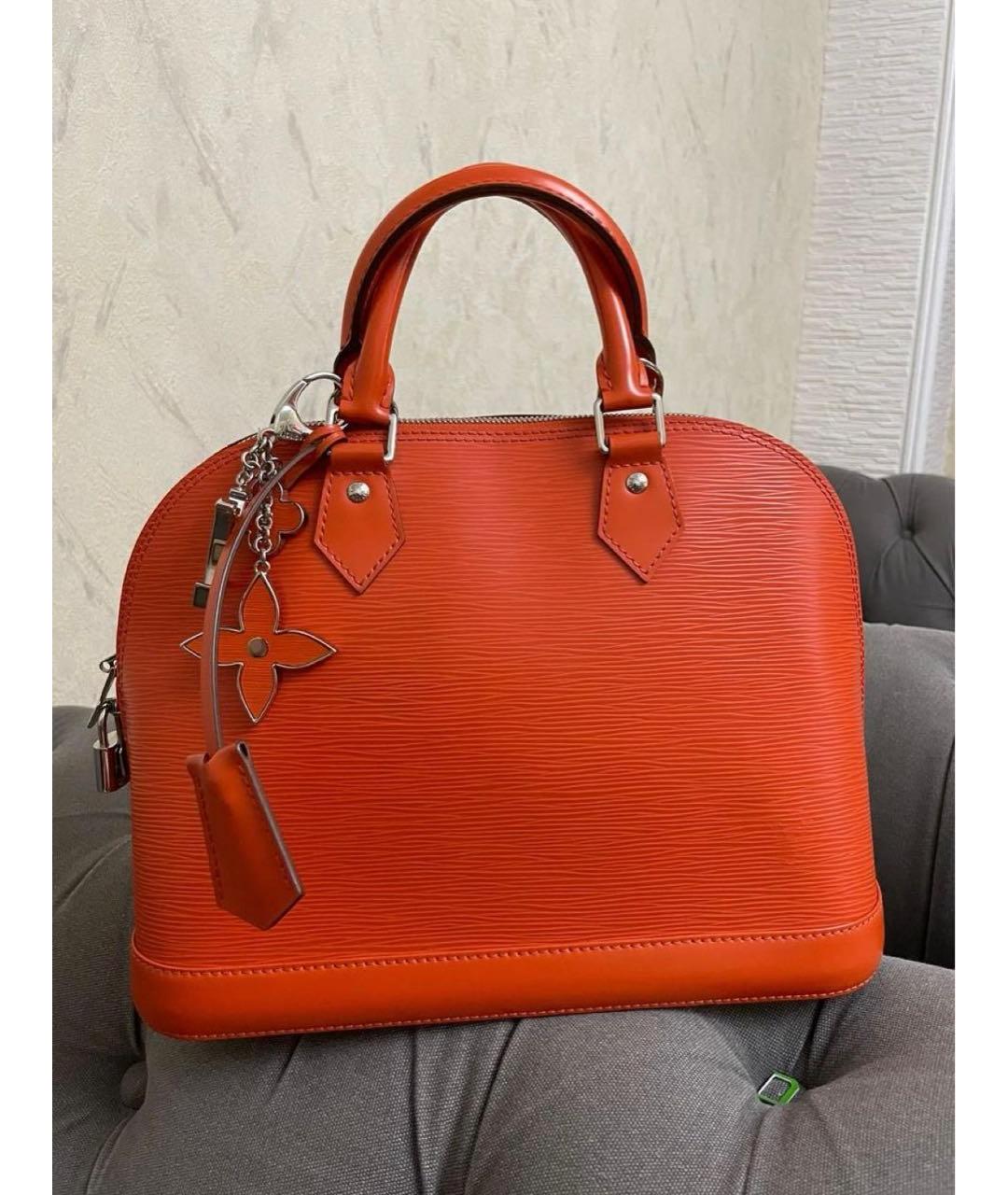 LOUIS VUITTON Оранжевая кожаная сумка с короткими ручками, фото 8