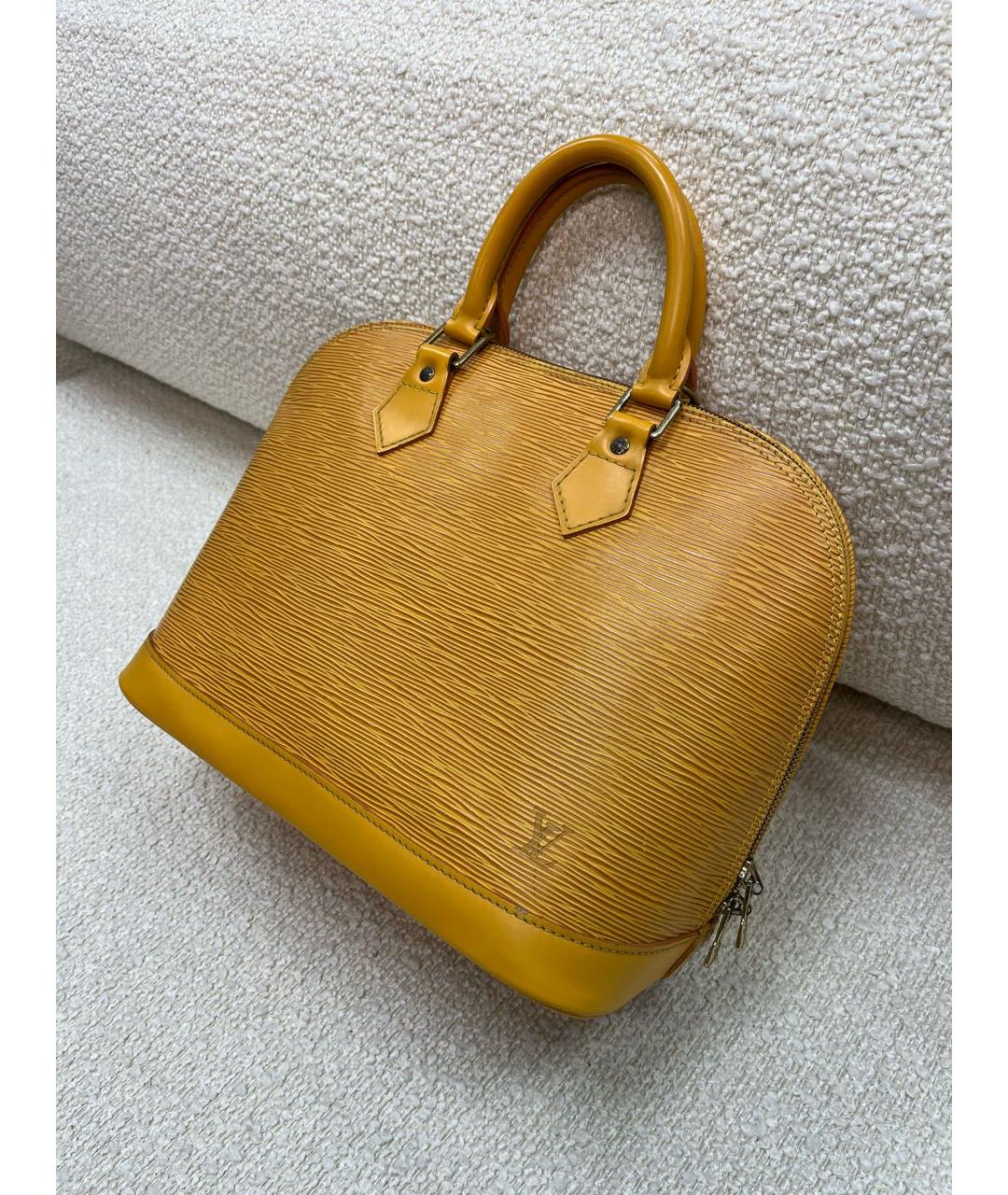 LOUIS VUITTON Горчичная кожаная сумка с короткими ручками, фото 5