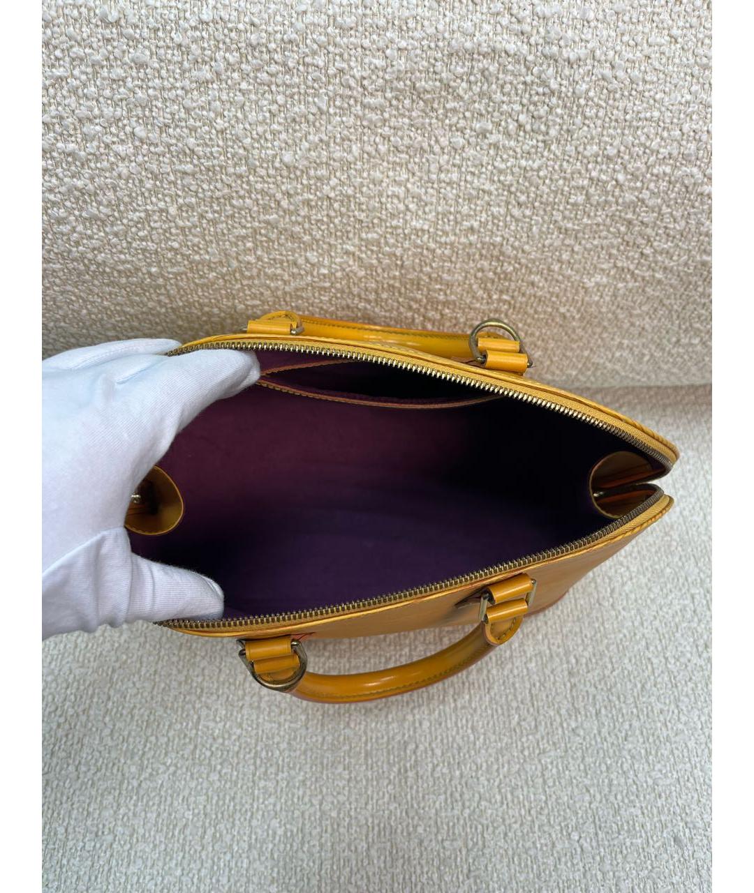 LOUIS VUITTON Горчичная кожаная сумка с короткими ручками, фото 4