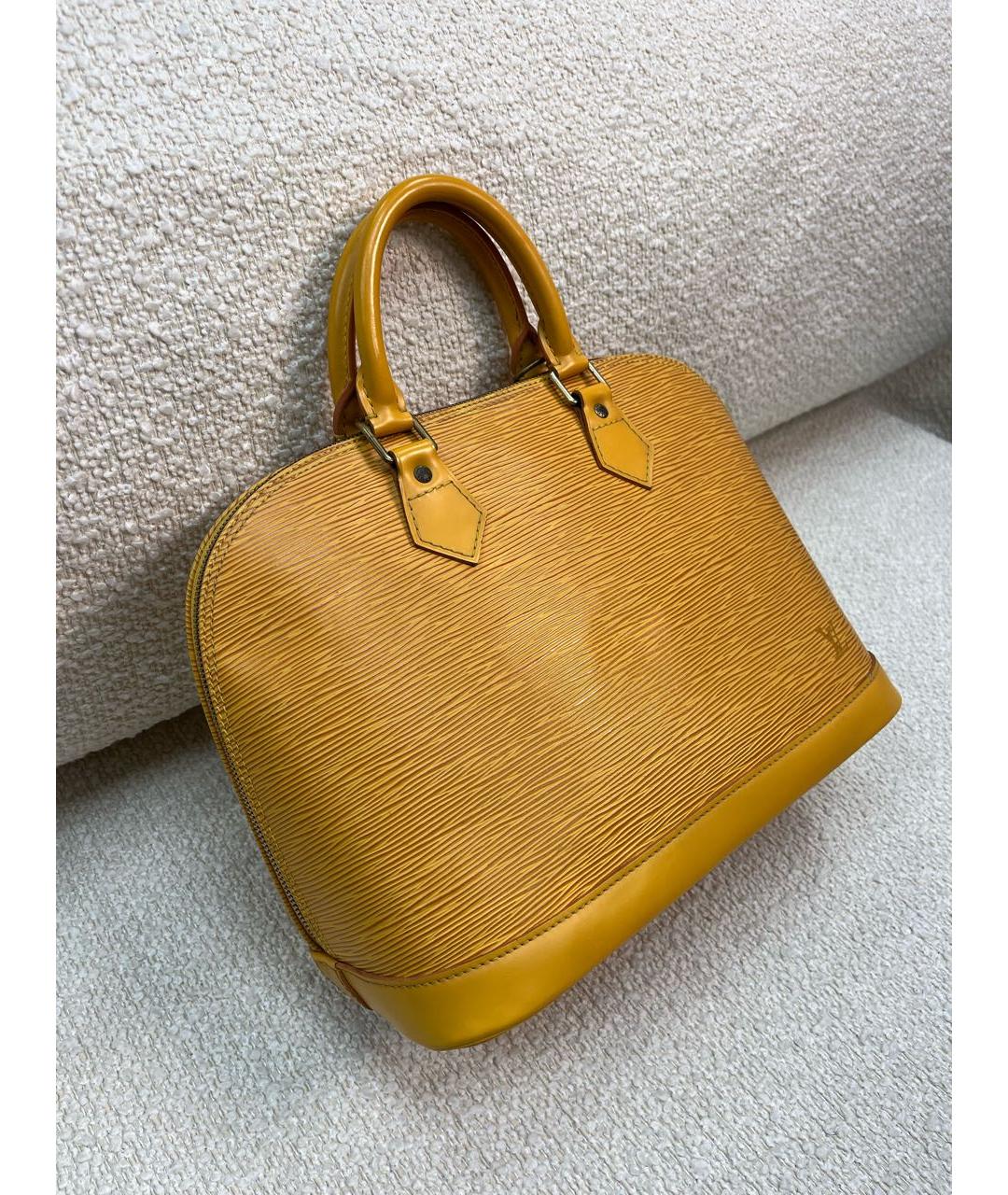 LOUIS VUITTON Горчичная кожаная сумка с короткими ручками, фото 2