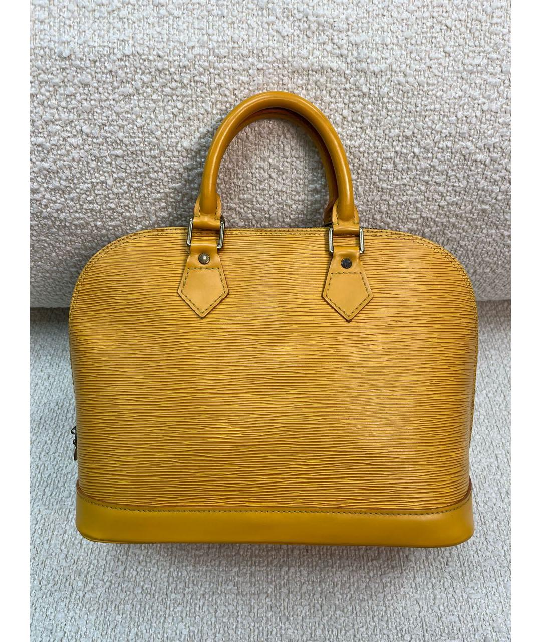 LOUIS VUITTON Горчичная кожаная сумка с короткими ручками, фото 3