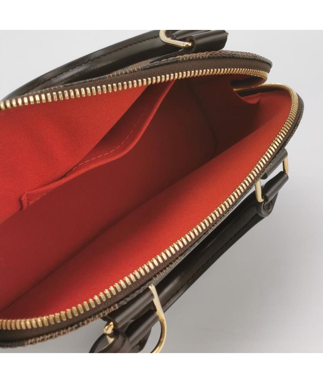 LOUIS VUITTON Коричневая кожаная сумка с короткими ручками, фото 6