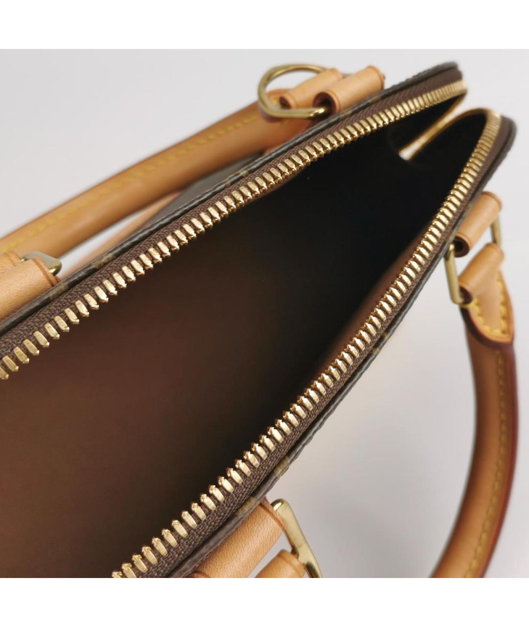 LOUIS VUITTON Коричневая кожаная сумка с короткими ручками, фото 6