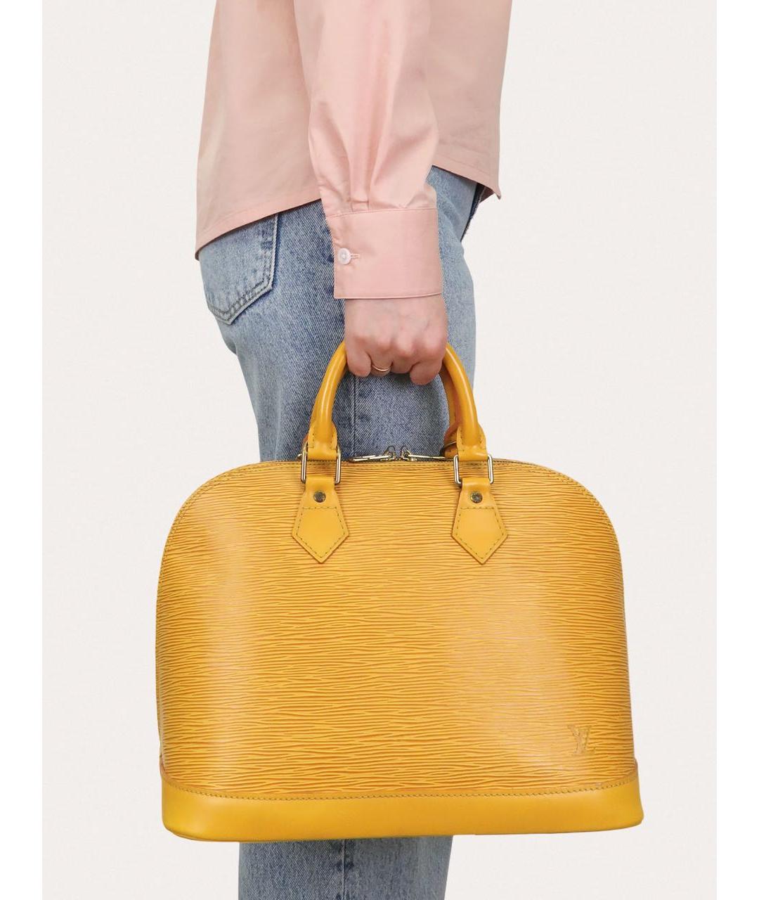 LOUIS VUITTON Желтая кожаная сумка с короткими ручками, фото 8