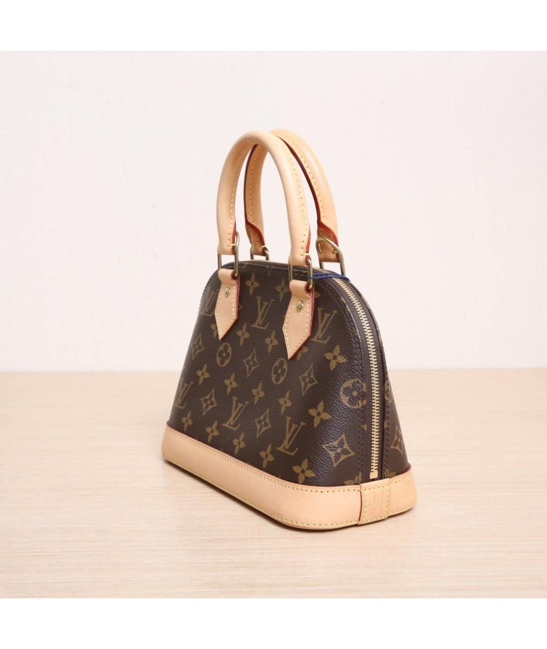 LOUIS VUITTON Коричневая кожаная сумка с короткими ручками, фото 4