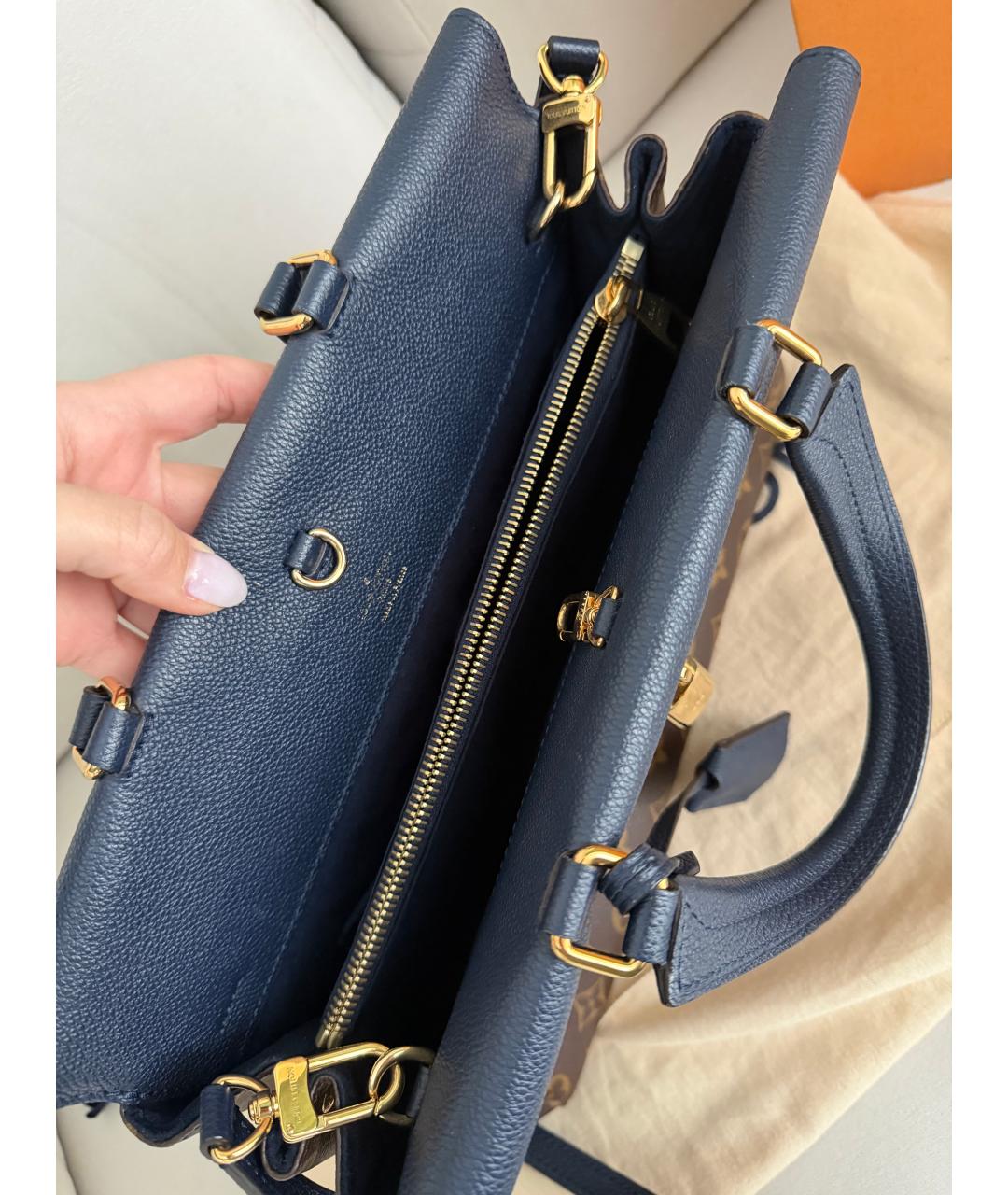 LOUIS VUITTON Коричневая кожаная сумка с короткими ручками, фото 4