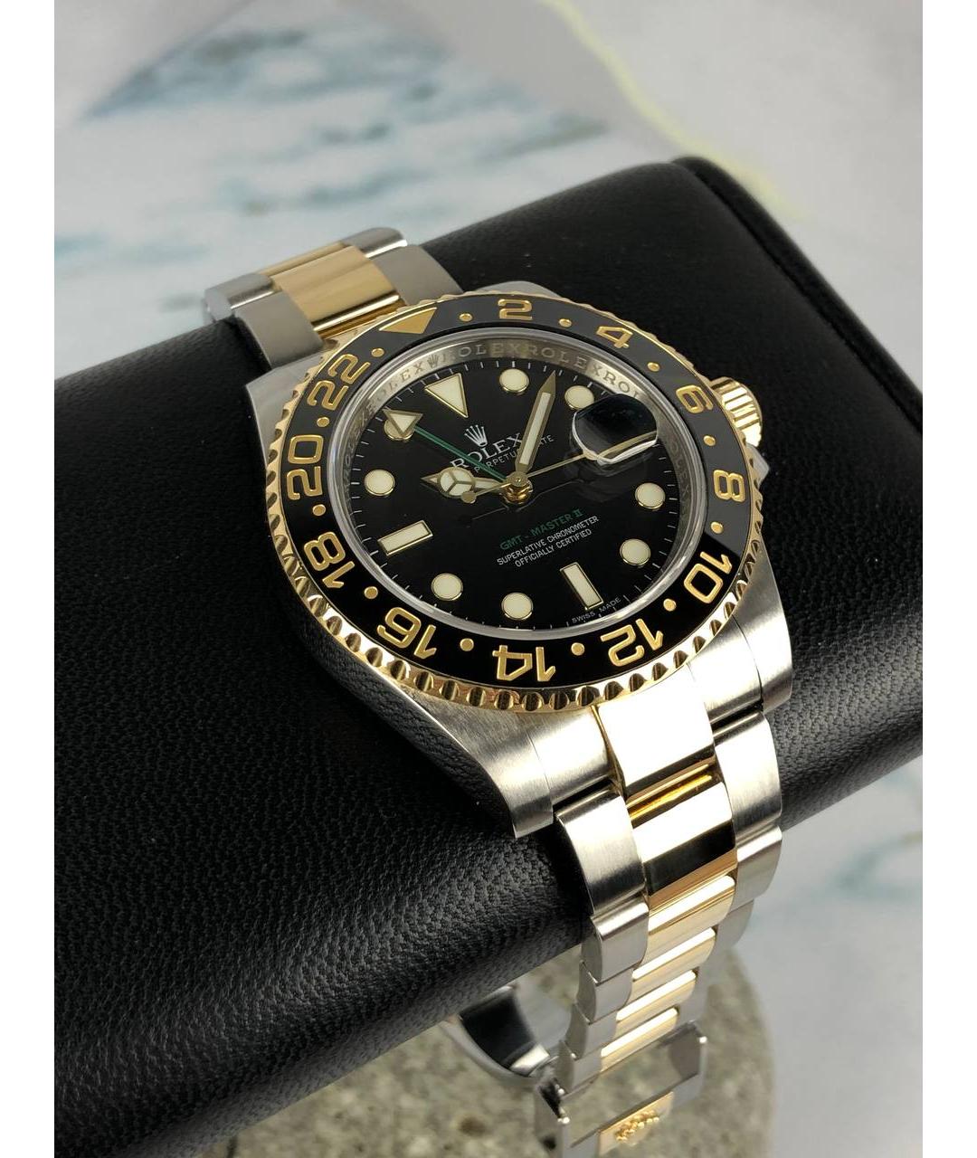 ROLEX Черные часы из желтого золота, фото 2