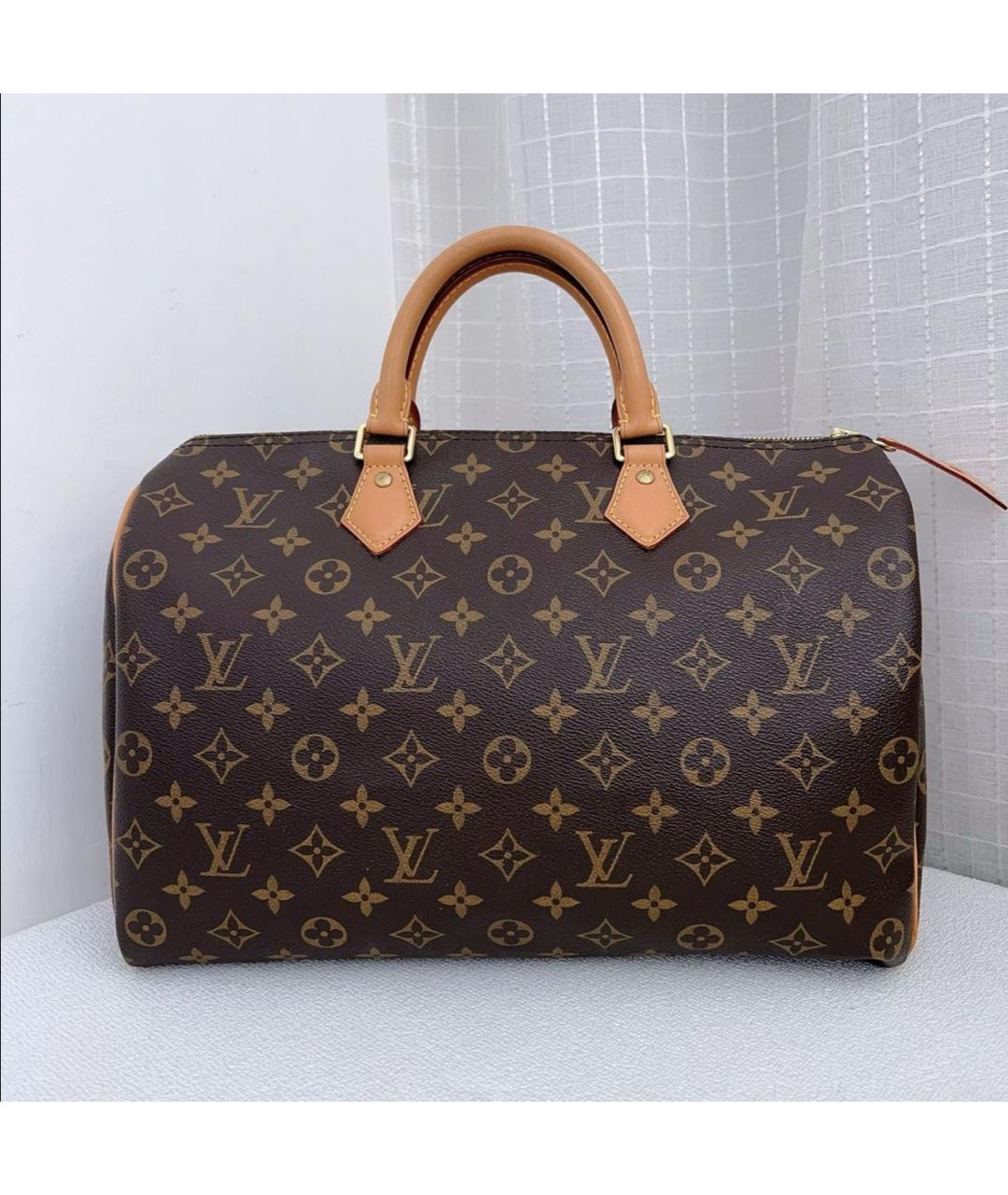 LOUIS VUITTON Коричневая кожаная сумка с короткими ручками, фото 2