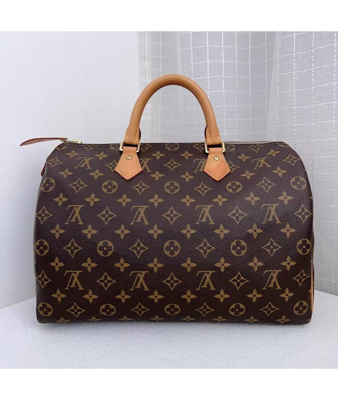 LOUIS VUITTON Коричневая кожаная сумка с короткими ручками, фото 9