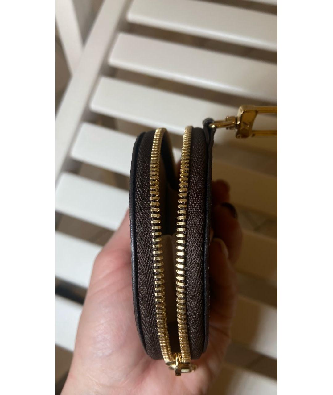 LOUIS VUITTON Коричневый кожаный кошелек, фото 3