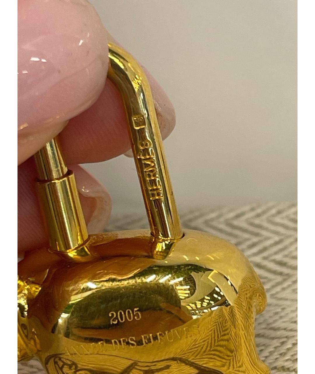HERMES Золотой брелок, фото 7