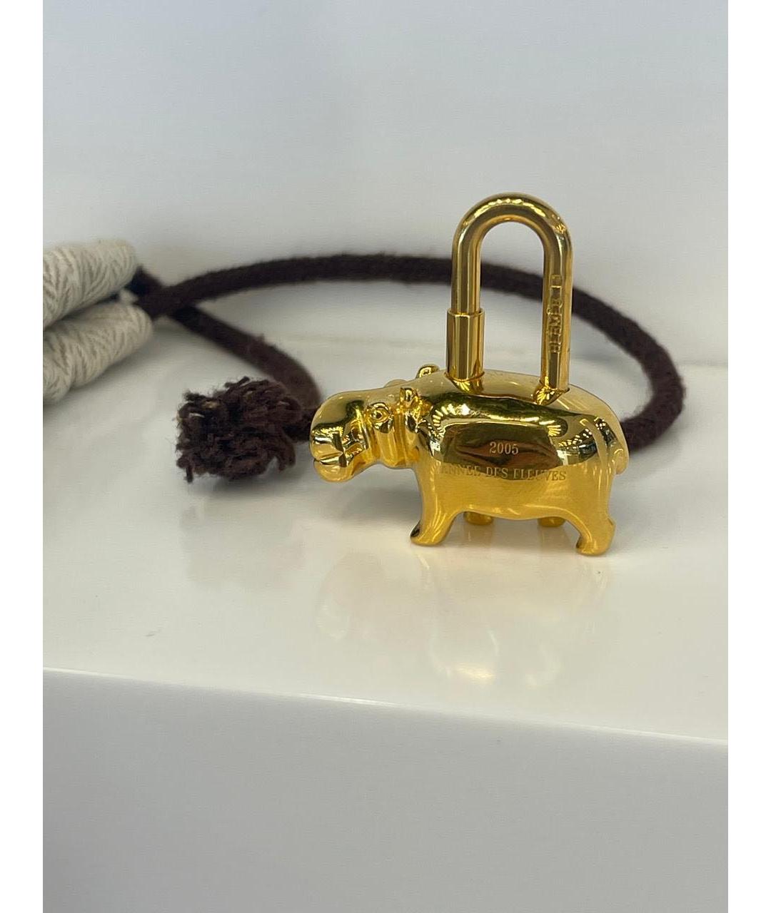 HERMES Золотой брелок, фото 6