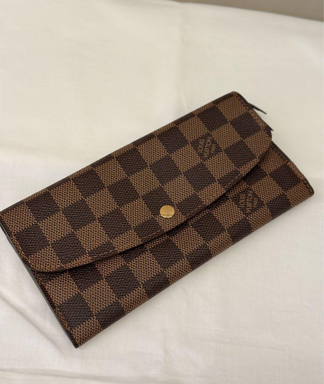 LOUIS VUITTON Коричневый кожаный кошелек, фото 8