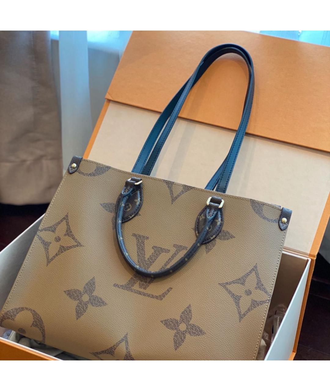 LOUIS VUITTON Коричневая кожаная сумка с короткими ручками, фото 3