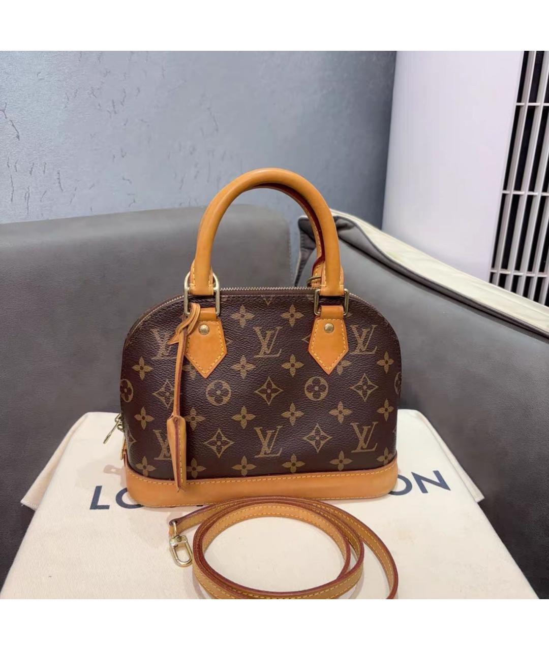 LOUIS VUITTON Коричневая кожаная сумка с короткими ручками, фото 9