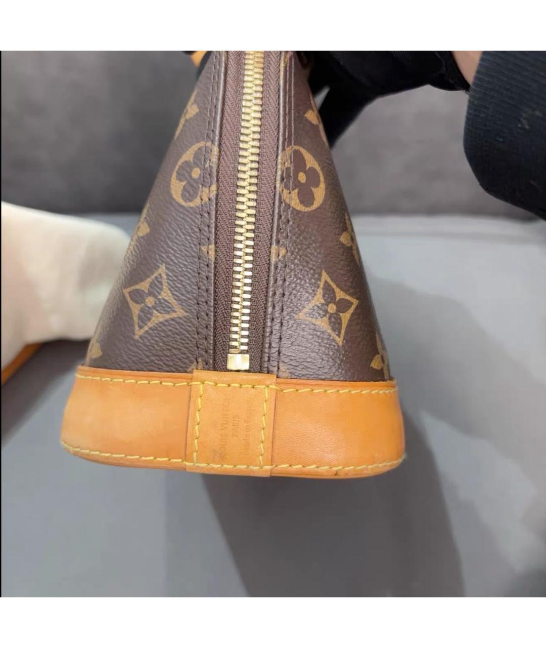 LOUIS VUITTON Коричневая кожаная сумка с короткими ручками, фото 5