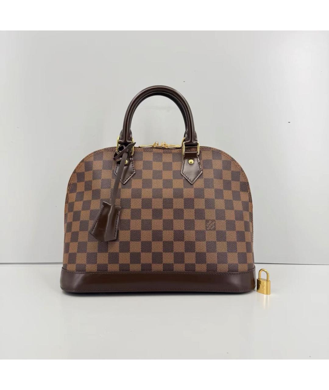 LOUIS VUITTON Коричневая кожаная сумка с короткими ручками, фото 9