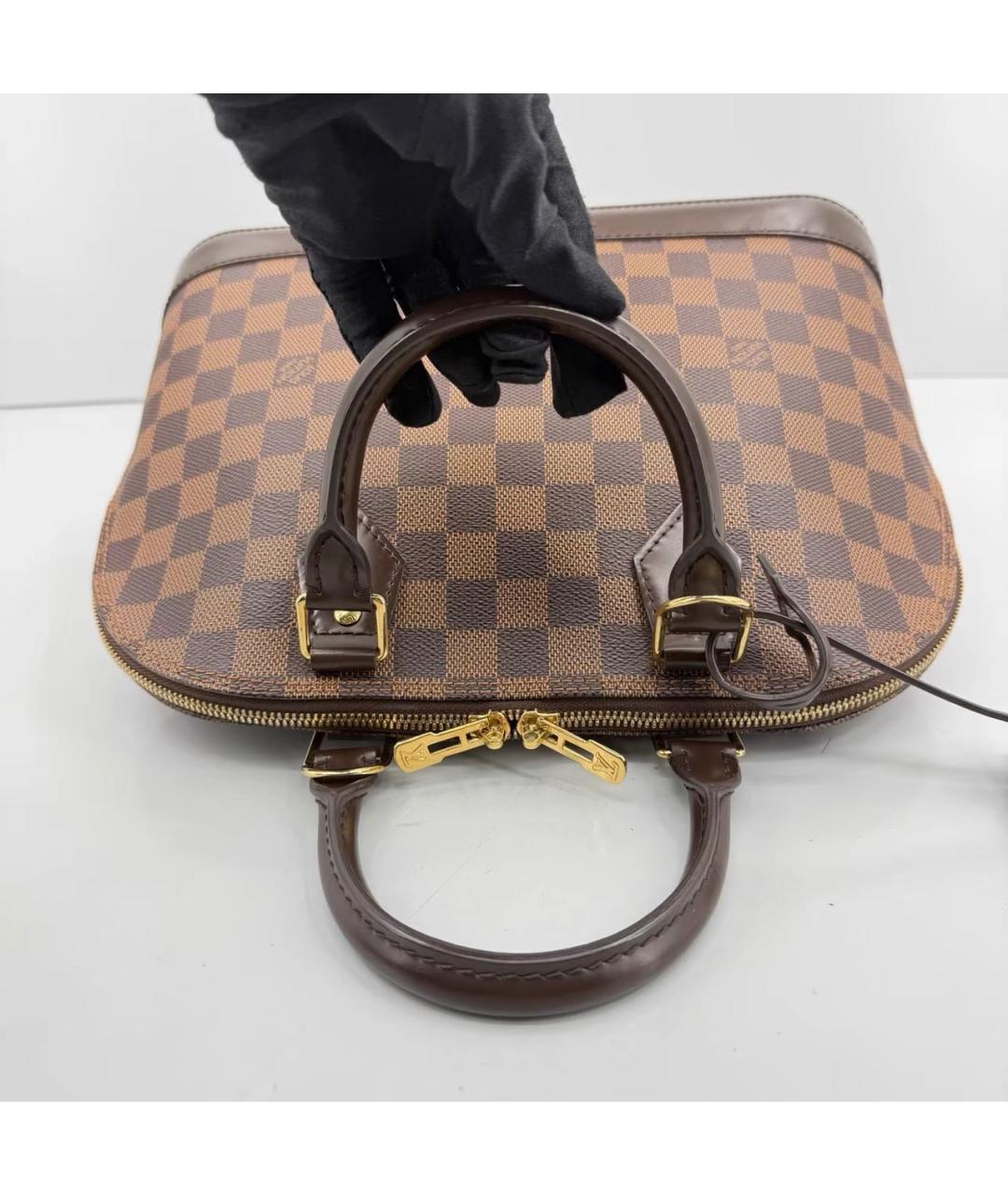 LOUIS VUITTON Коричневая кожаная сумка с короткими ручками, фото 7