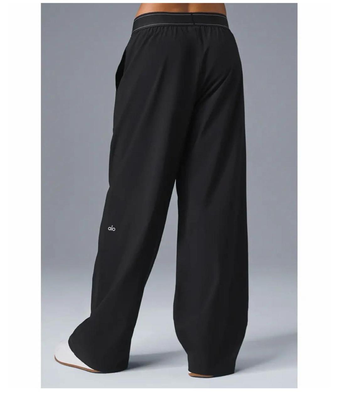 ALO YOGA Черные полиэстеровые спортивные брюки и шорты, фото 3