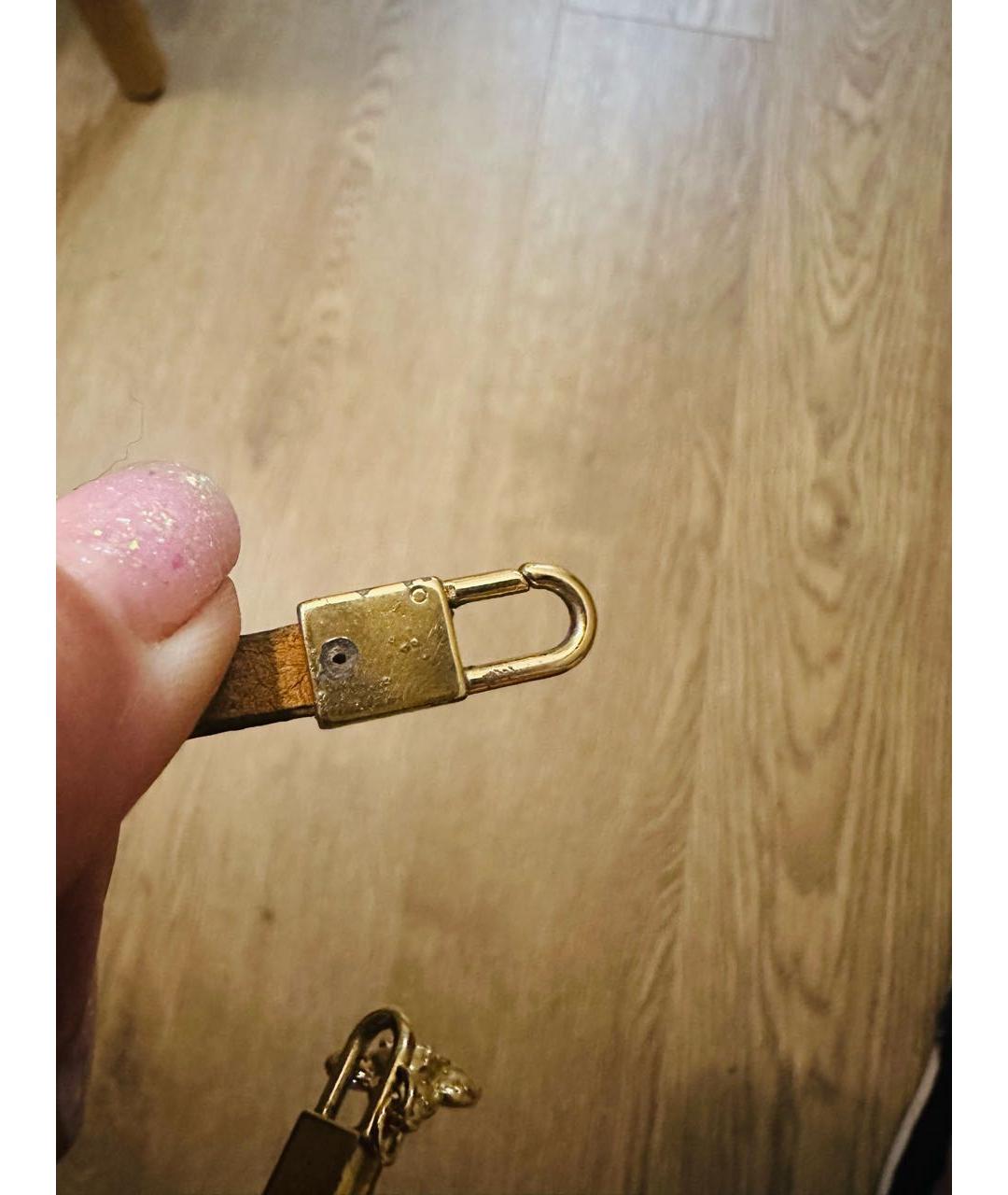 LOUIS VUITTON Коричневый латунный браслет, фото 5