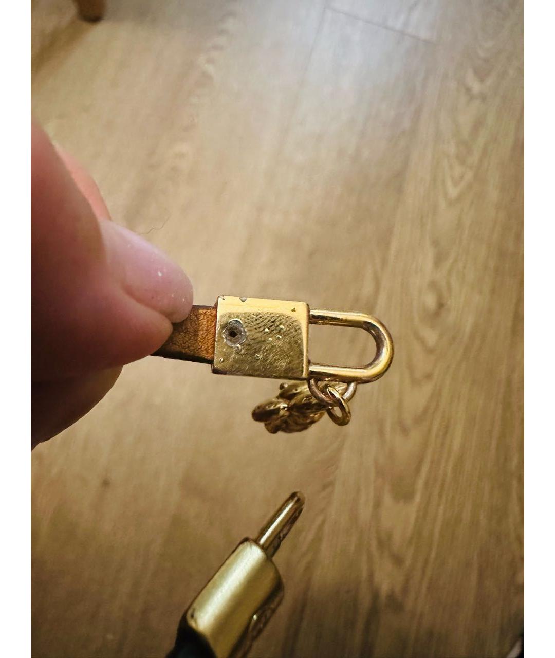 LOUIS VUITTON Коричневый латунный браслет, фото 6