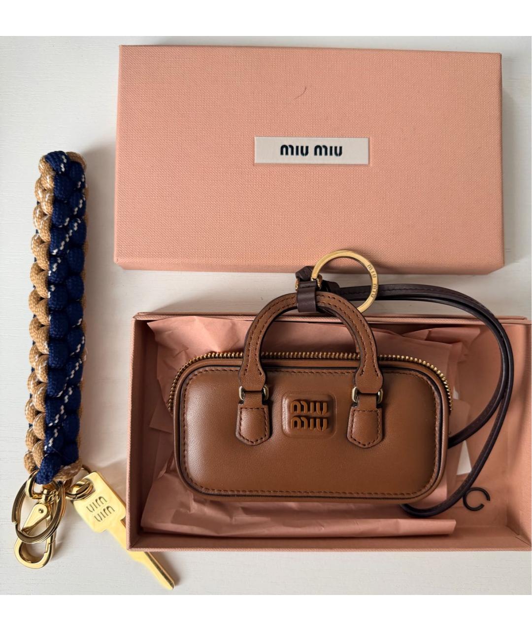 MIU MIU Коричневый брелок, фото 6