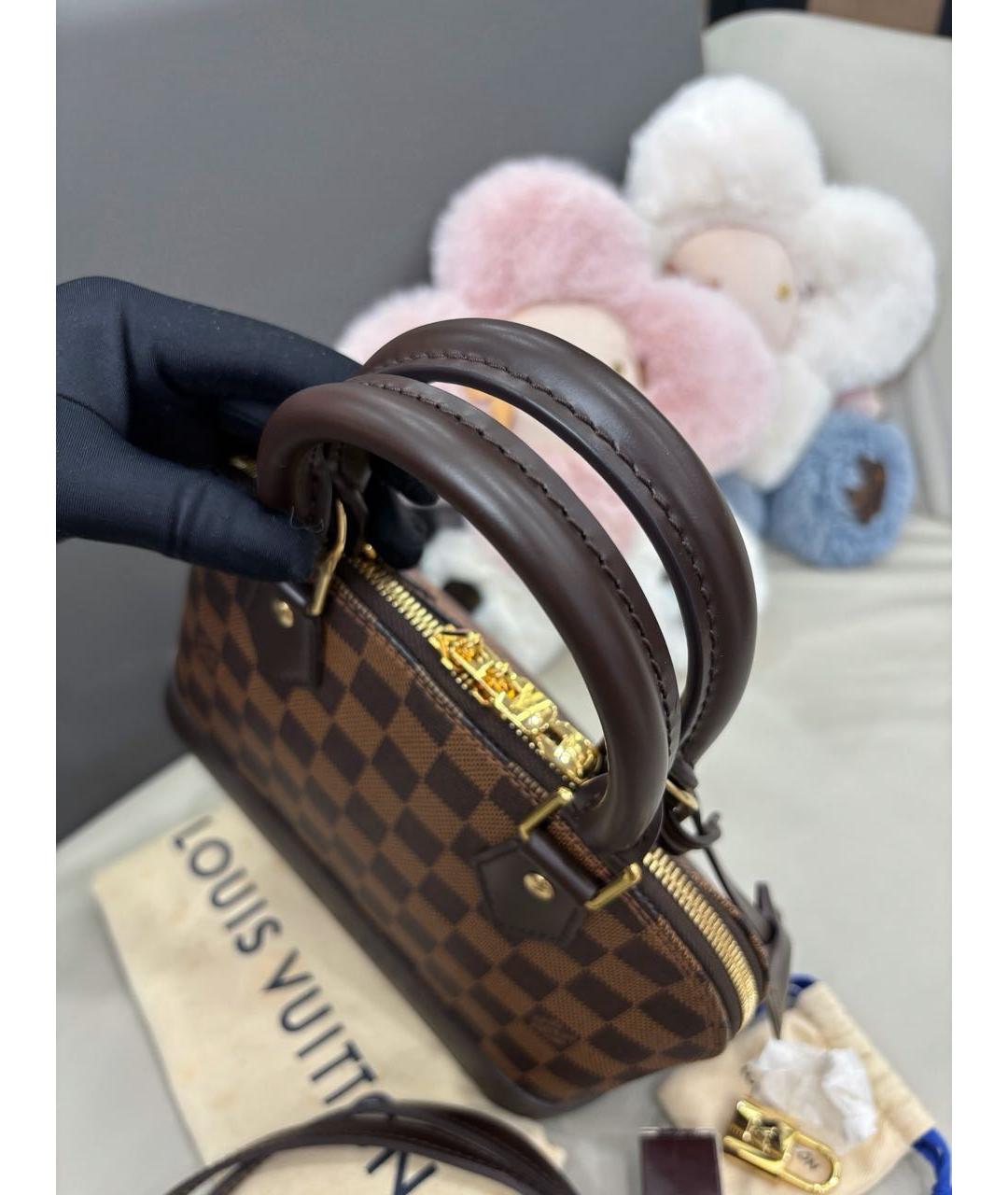 LOUIS VUITTON Коричневая кожаная сумка с короткими ручками, фото 7