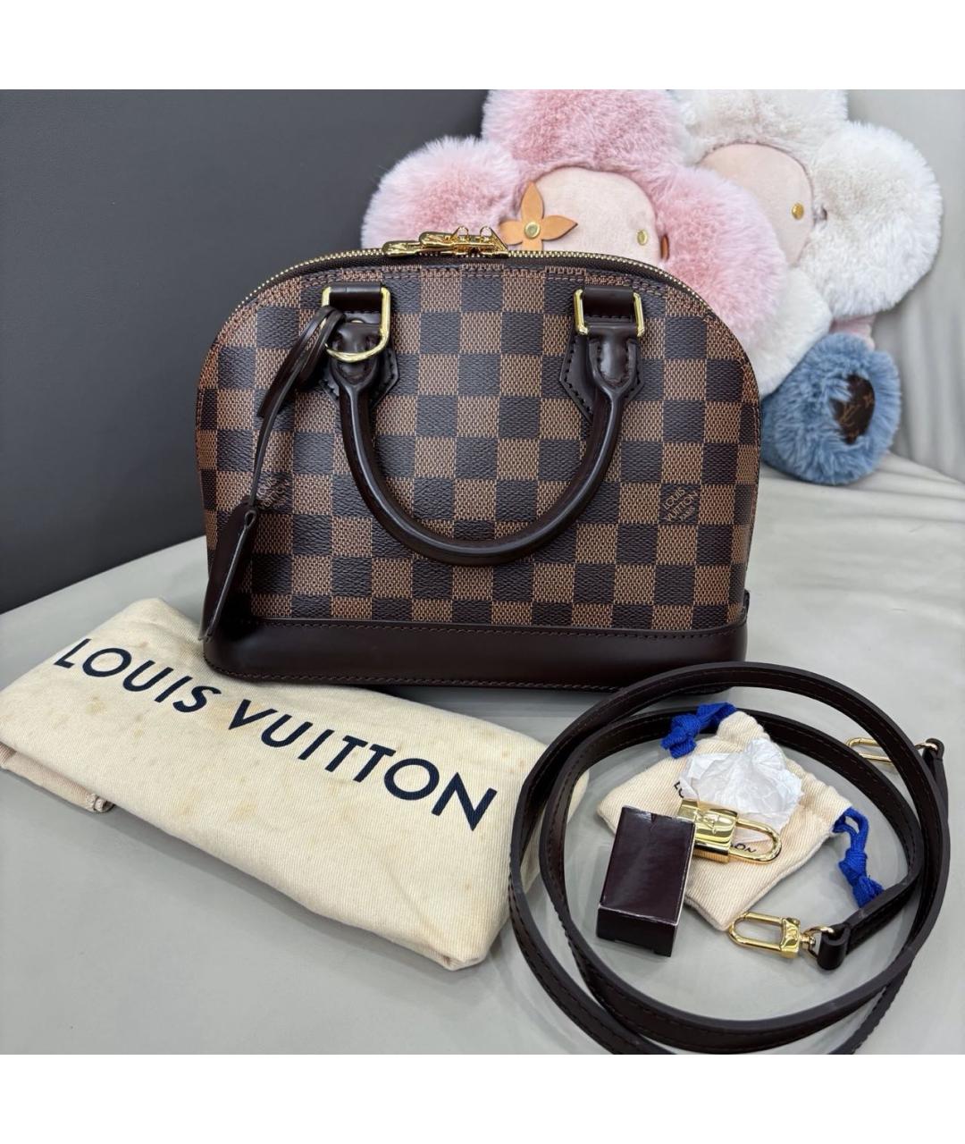 LOUIS VUITTON Коричневая кожаная сумка с короткими ручками, фото 9
