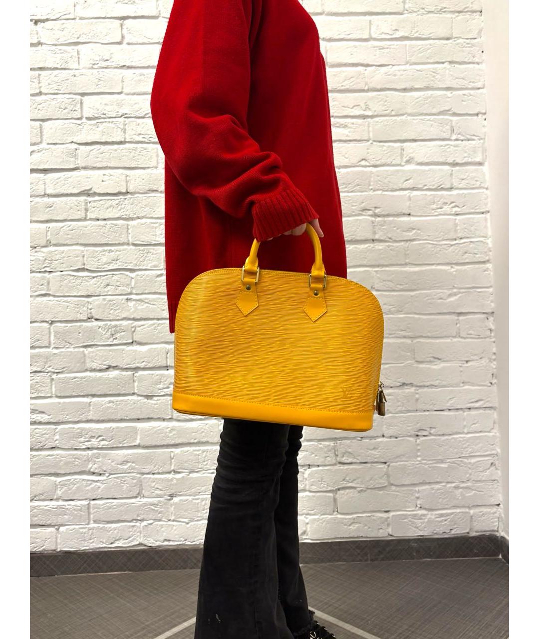 LOUIS VUITTON Желтая кожаная сумка с короткими ручками, фото 5