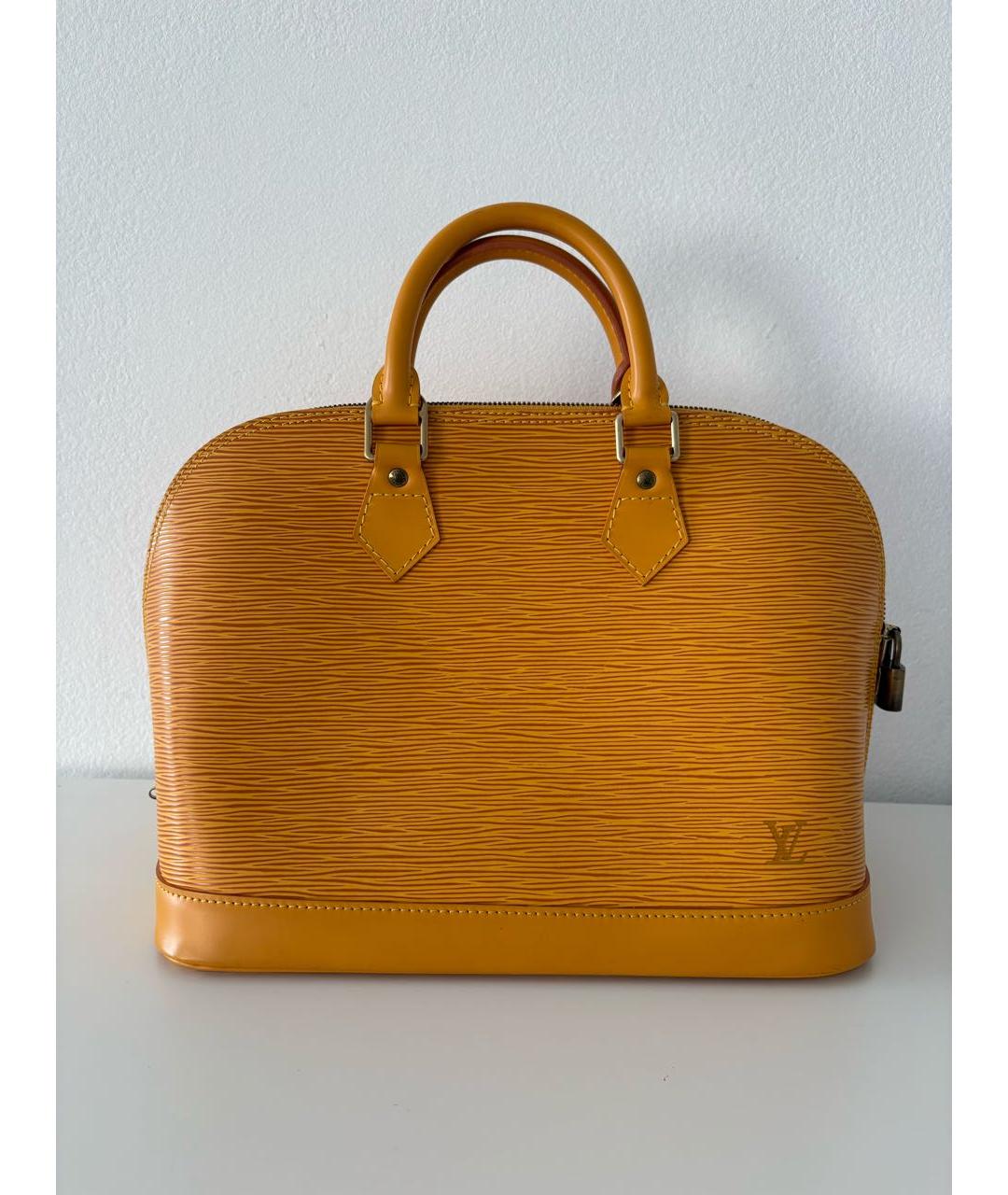 LOUIS VUITTON Желтая кожаная сумка с короткими ручками, фото 8