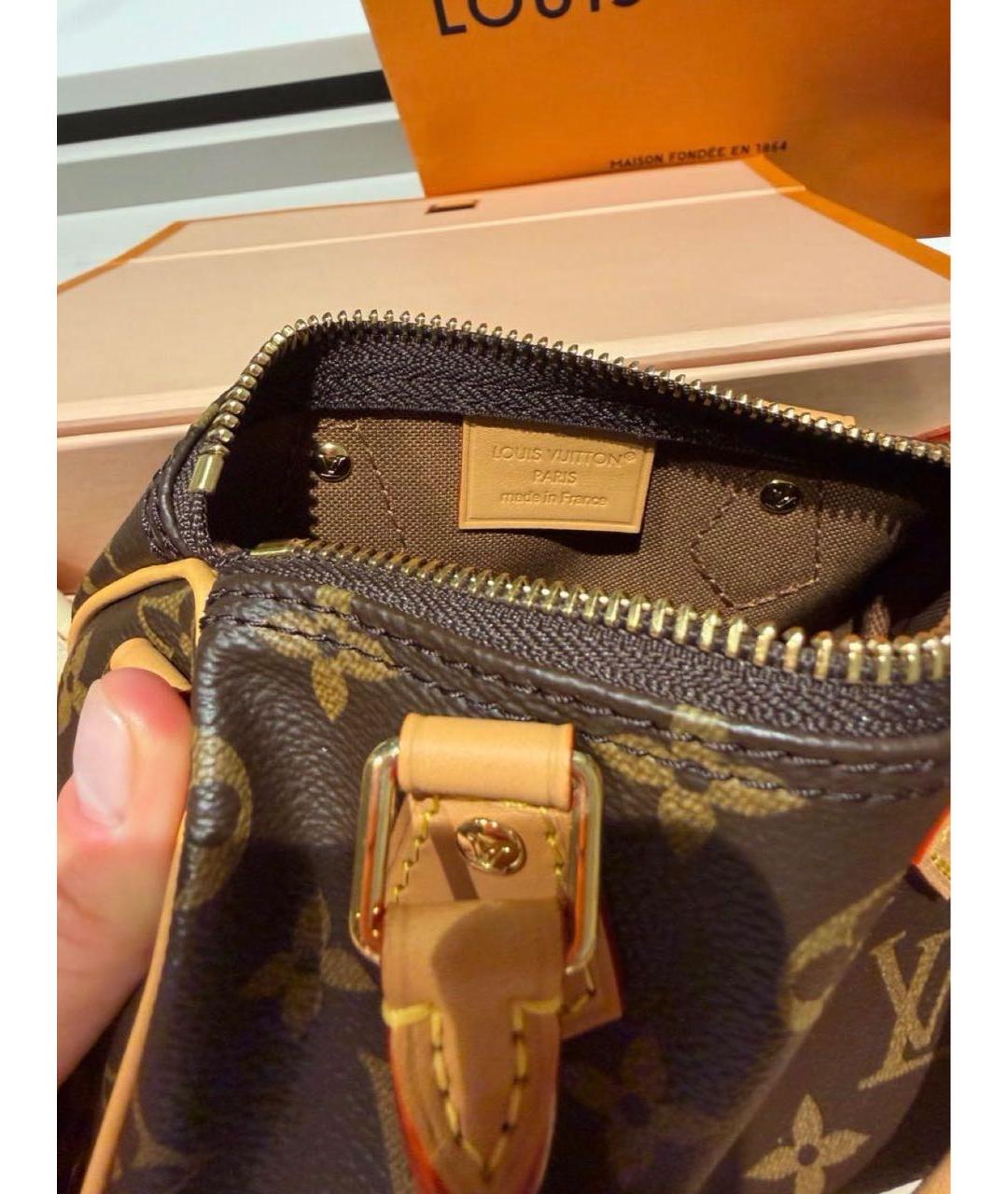 LOUIS VUITTON Коричневая кожаная сумка с короткими ручками, фото 4