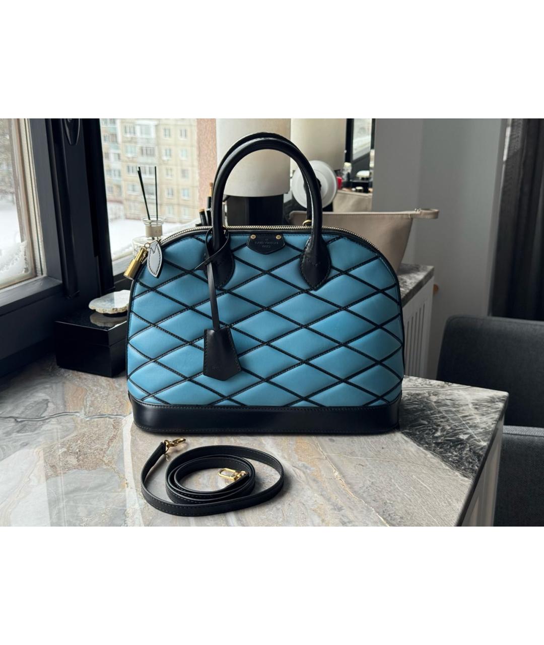 LOUIS VUITTON Бирюзовая кожаная сумка с короткими ручками, фото 6