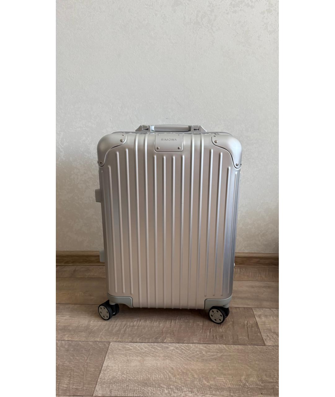Rimowa Серебрянный чемодан, фото 10
